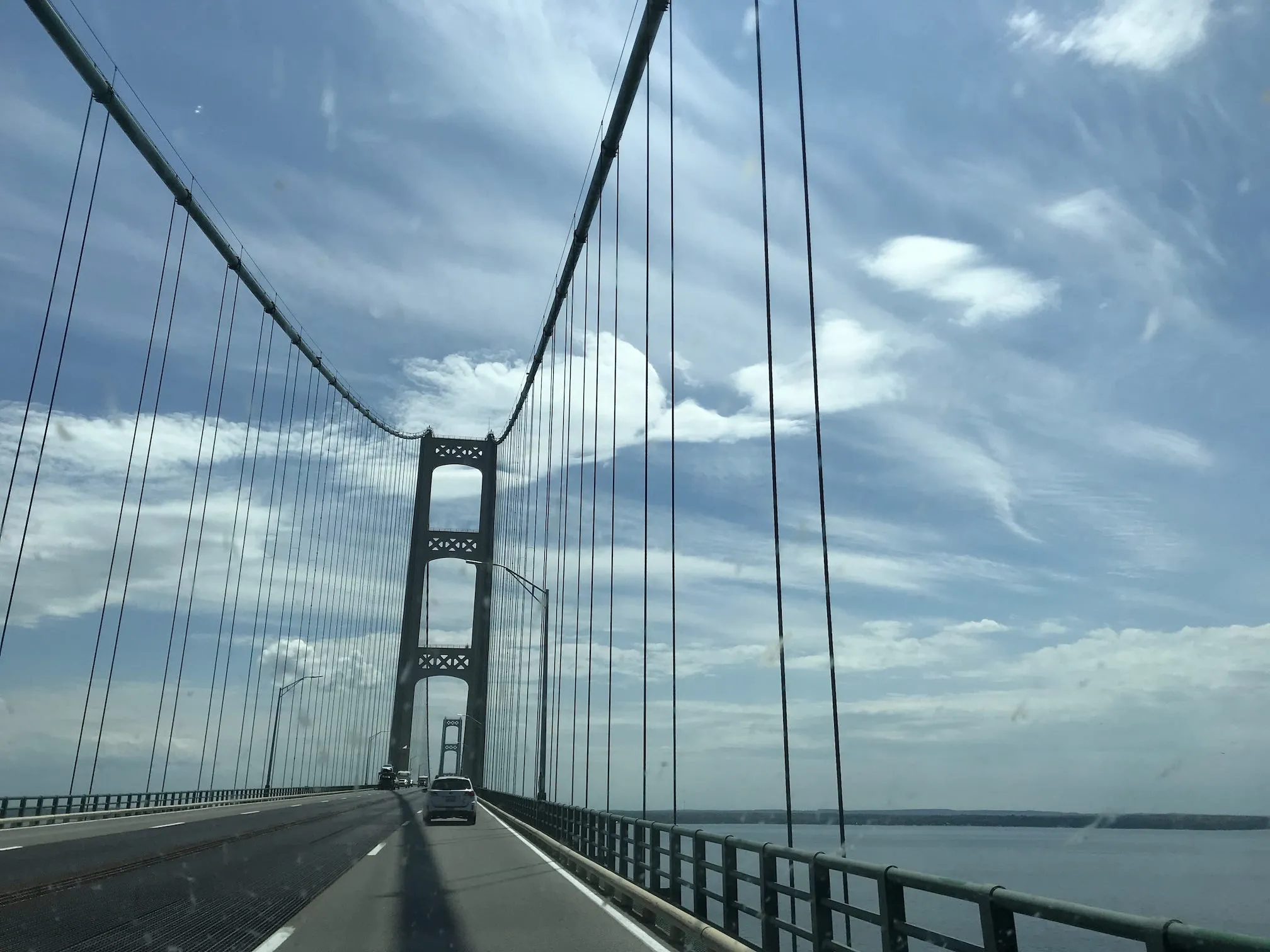 Photo taken from inside a car going over the Mackinac Bridge